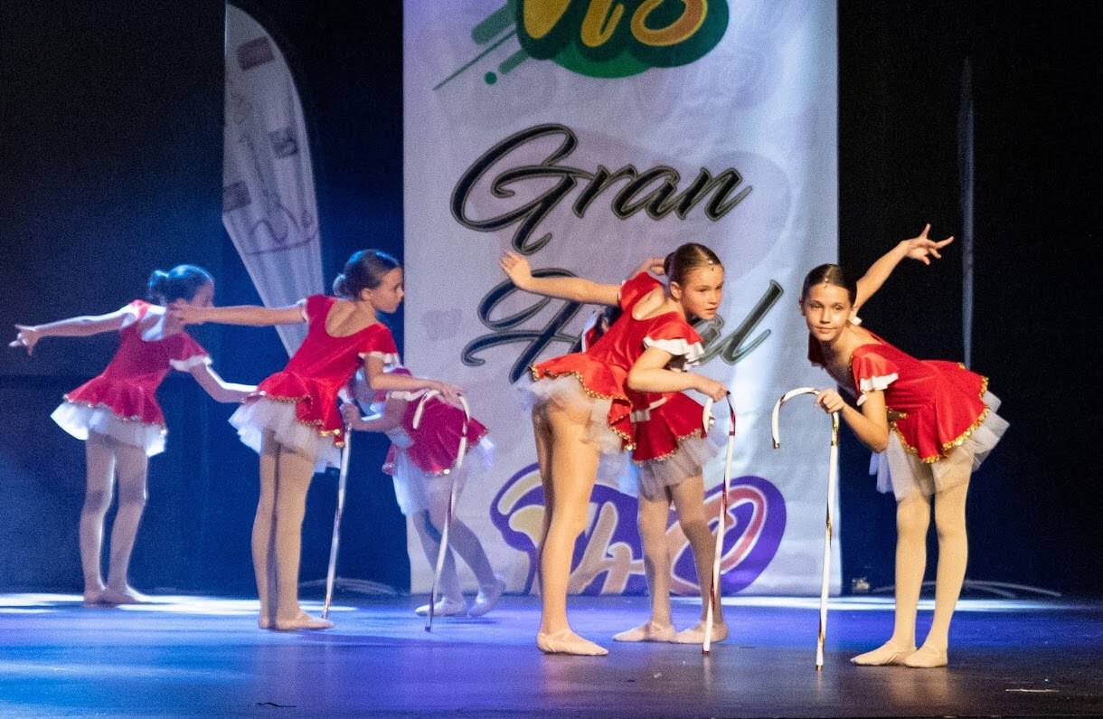 children performing creative dance on the stage